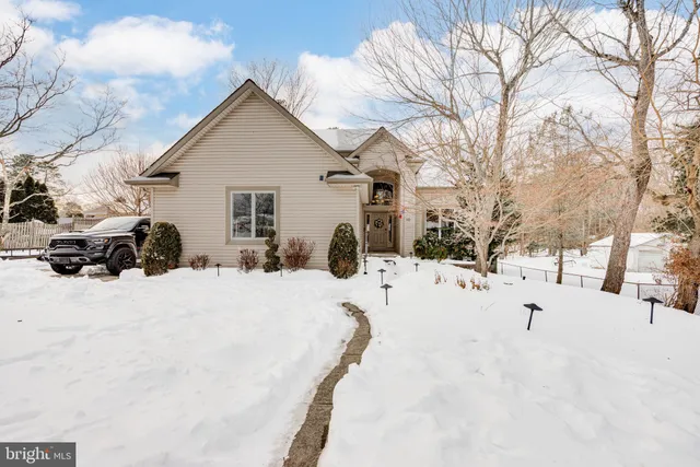 a view of snow on the side of the road