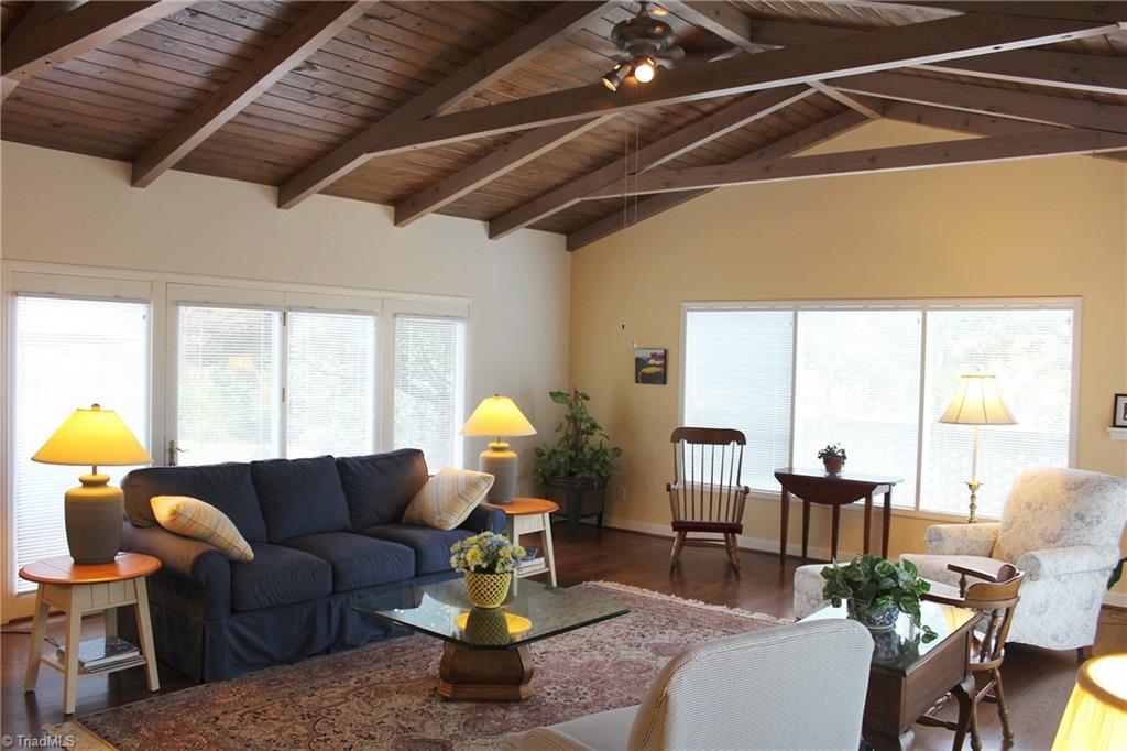 1502 Rogers Road Graham, NC 27253 - Photo 11 of 25 Vaulted sun room provides view of pool and yard. It is open to the kitchen.