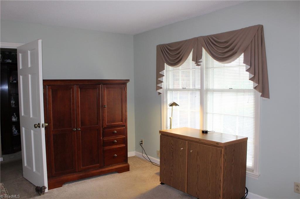 1502 Rogers Road Graham, NC 27253 - Photo 15 of 25 Bedroom 2 on main floor with bath could be a guest bedroom.