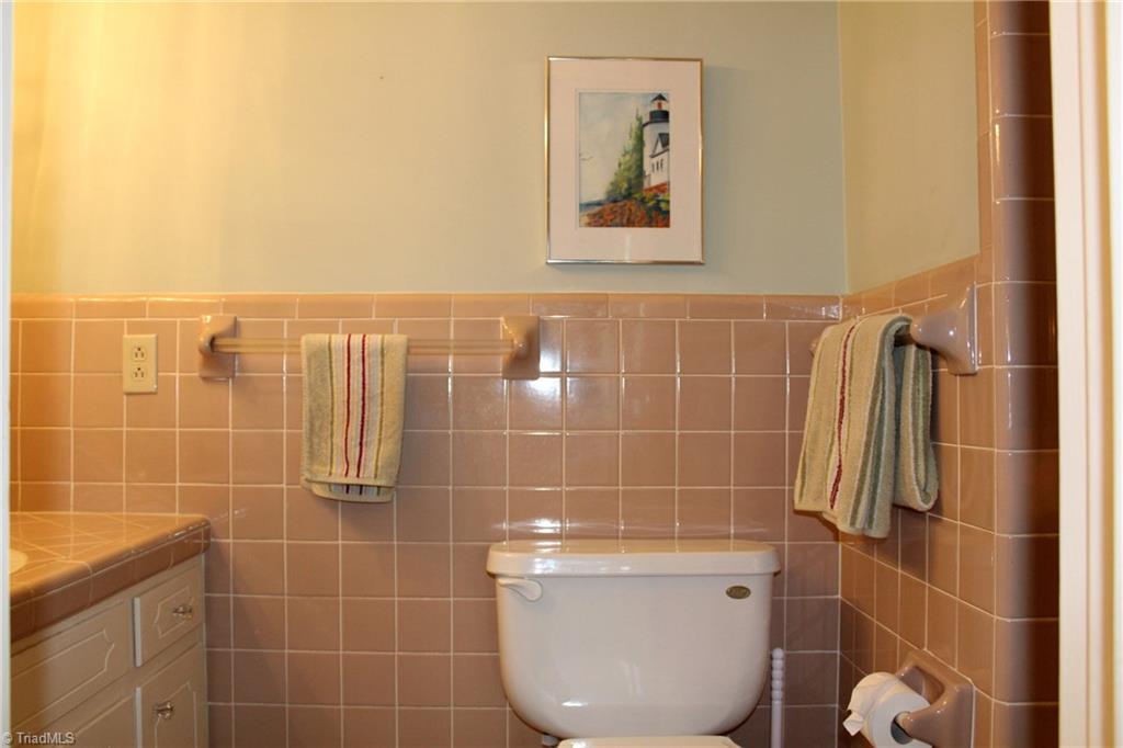 1502 Rogers Road Graham, NC 27253 - Photo 16 of 25 Bedroom 2 on main floor has a bathroom with shower.