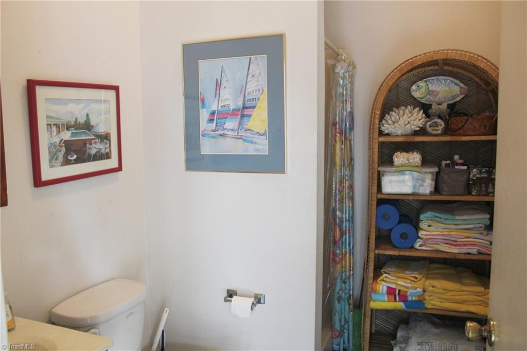 1502 Rogers Road Graham, NC 27253 - Photo 23 of 25 Bathroom in garage is very convenient for pool.
