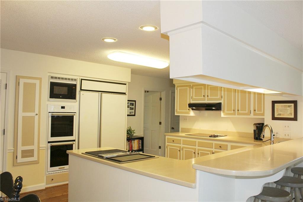 1502 Rogers Road Graham, NC 27253 - Photo 8 of 25 Kitchen with double ovens, microwave.