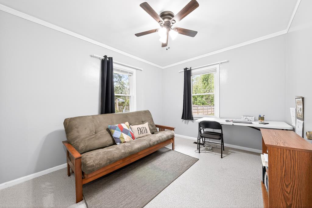 5829 Dearborn Avenue Columbus, GA 31909 - Photo 23 of 29 a living room with furniture and a window