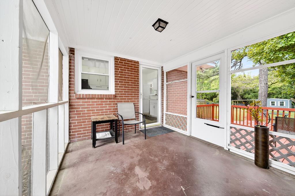 5829 Dearborn Avenue Columbus, GA 31909 - Photo 24 of 29 a view of a livingroom with furniture and floor to ceiling window