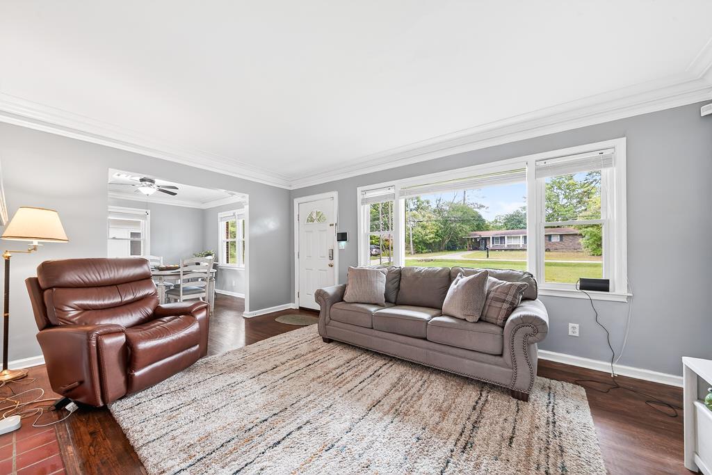 5829 Dearborn Avenue Columbus, GA 31909 - Photo 3 of 29 a living room with furniture and a large window