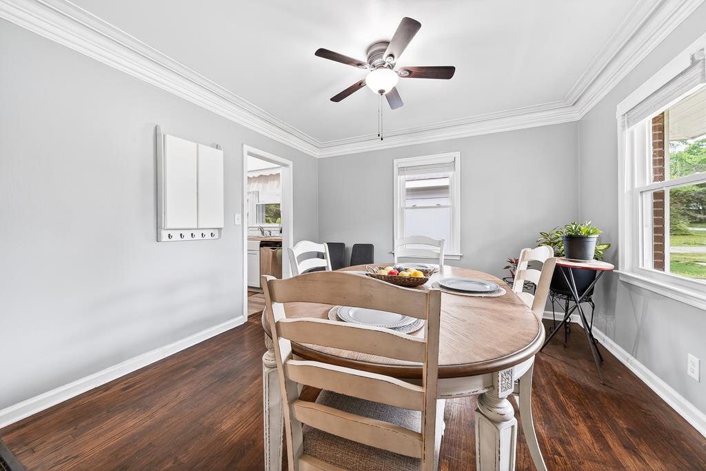 5829 Dearborn Avenue Columbus, GA 31909 - Photo 6 of 29 a view of a dining room with furniture window and wooden floor