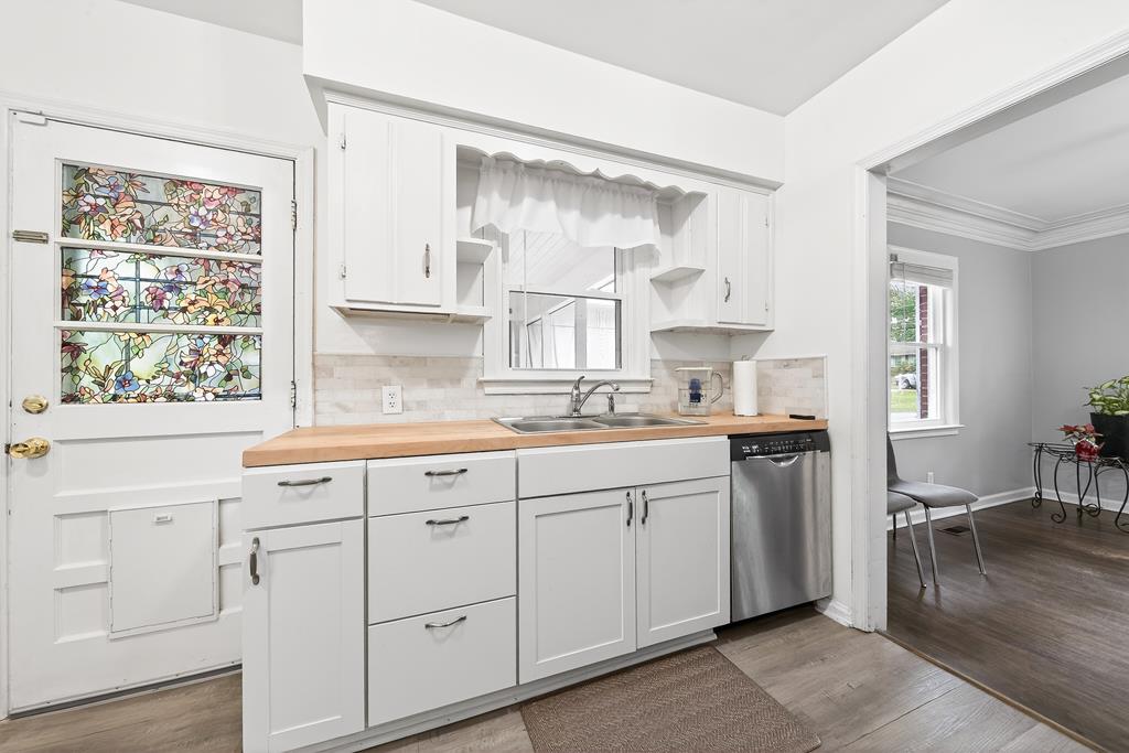 5829 Dearborn Avenue Columbus, GA 31909 - Photo 10 of 29 a view of cabinets a sink and a window in a room