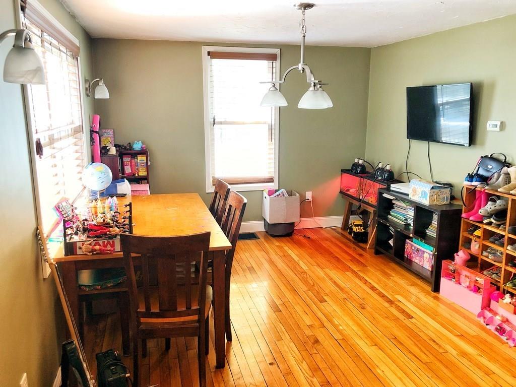 68 Barre Road Petersham, MA 01366 - Photo 8 of 25 a view of a dining room with furniture and a window