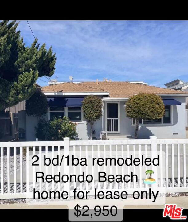 2607 Rockefeller Lane, Unit 1 Redondo Beach, CA 90278 - Photo 11 of 11 a view of house with a sign on the wall