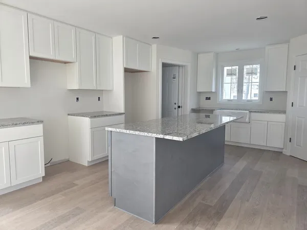 a large kitchen with cabinets