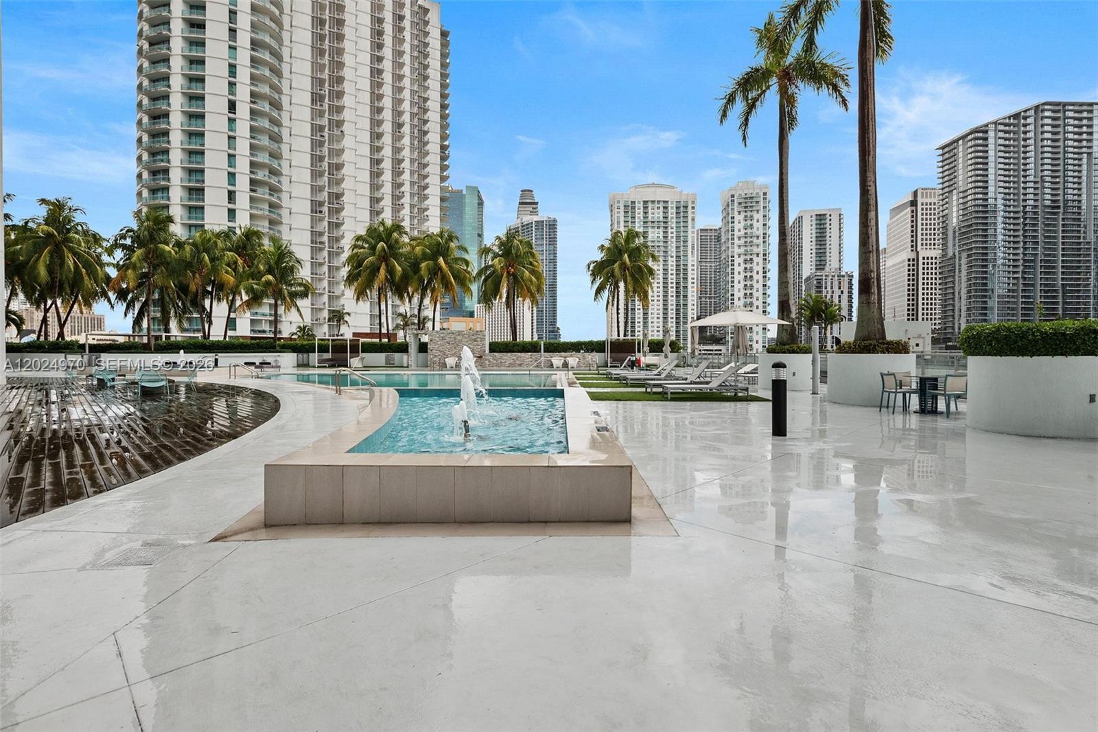 90 Southwest 3rd Street, Unit 3810 Miami, FL 33130 - Photo 33 of 45 a large building with a table and chairs