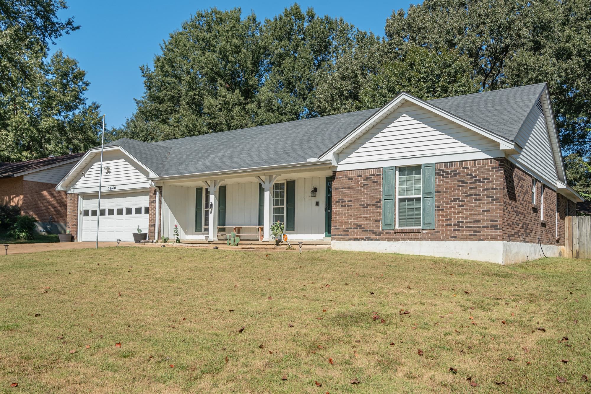 5640 Rensslaer Drive Memphis, TN 38135 - Photo 1 of 29 a front view of a house with a garden