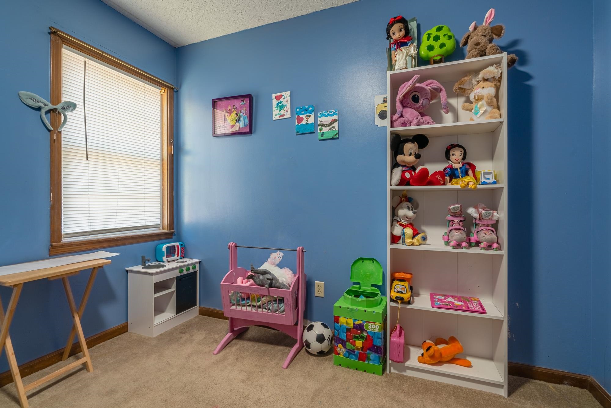 5640 Rensslaer Drive Memphis, TN 38135 - Photo 21 of 29 a room with toys and a window