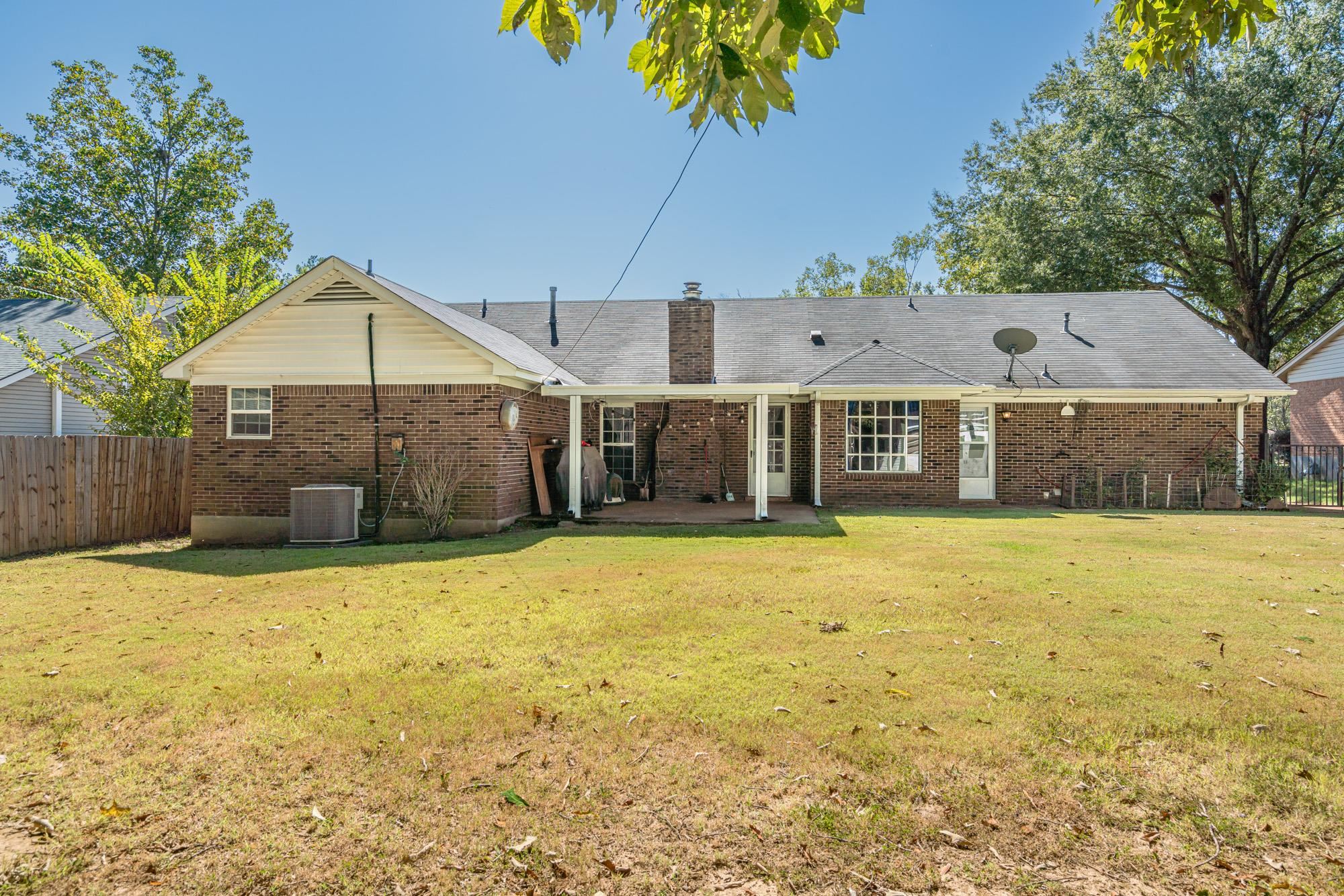 5640 Rensslaer Drive Memphis, TN 38135 - Photo 26 of 29 a front view of a house with a yard