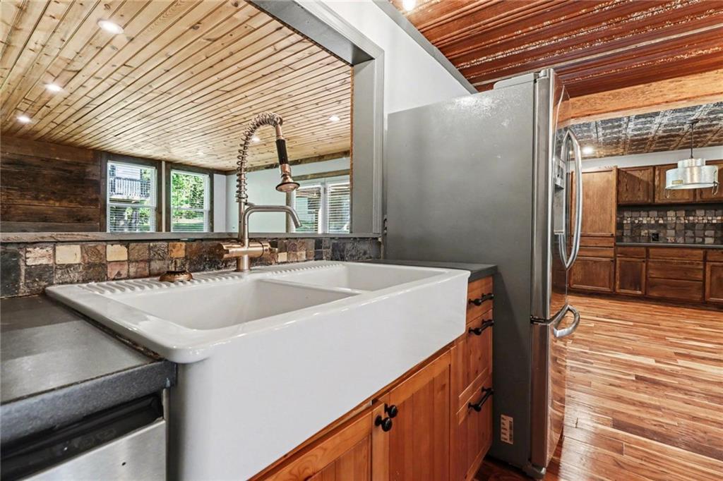 450 Big Springs Road Southeast Calhoun, GA 30701 - Photo 11 of 39 a view of a kitchen from a sink and a microwave