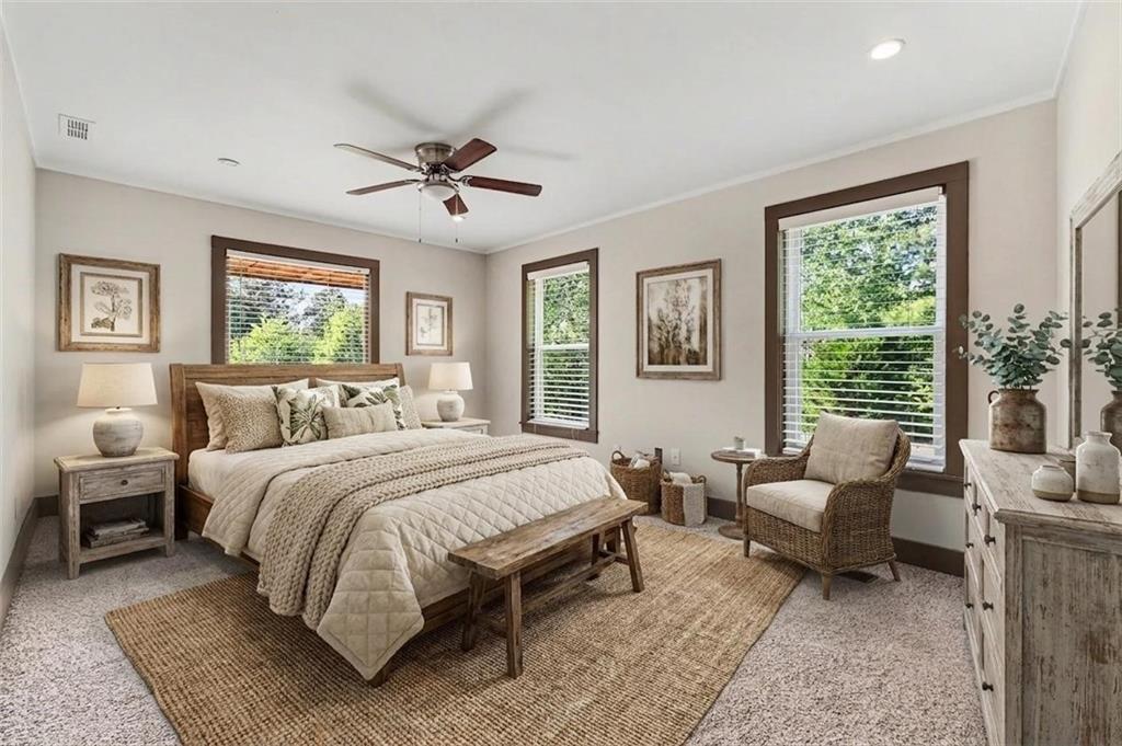 450 Big Springs Road Southeast Calhoun, GA 30701 - Photo 26 of 39 a spacious bedroom with a bed and glass window