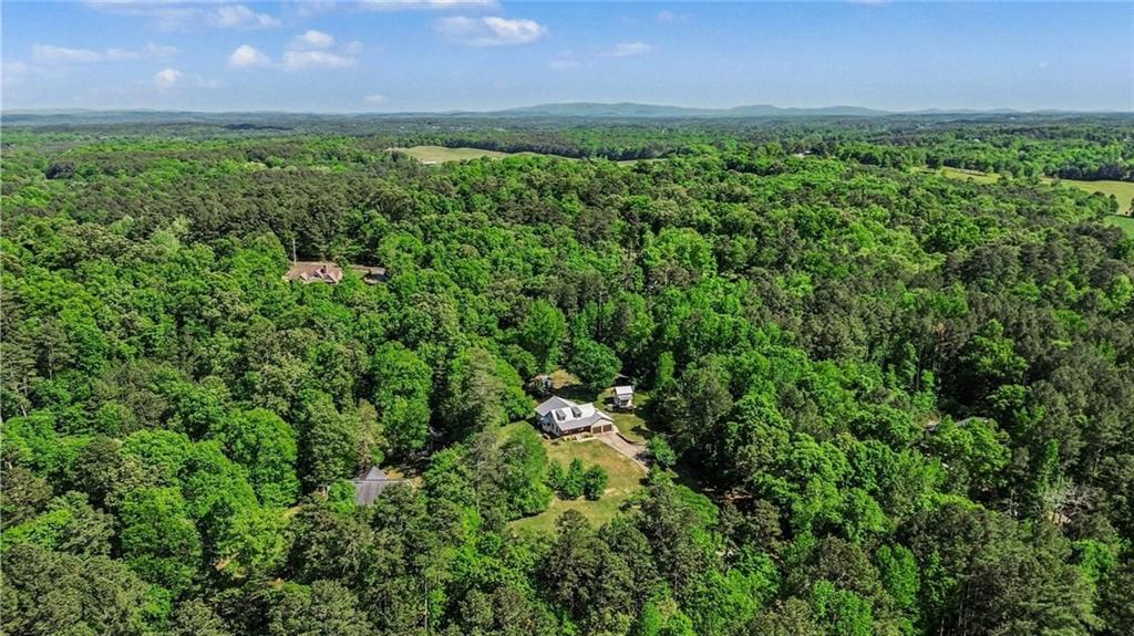 450 Big Springs Road Southeast Calhoun, GA 30701 - Photo 37 of 39 an aerial view of a houses with a yard