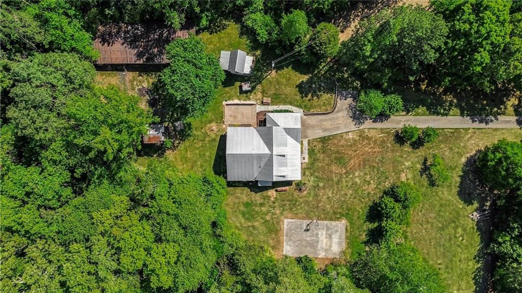 450 Big Springs Road Southeast Calhoun, GA 30701 - Photo 39 of 39 an aerial view of a house with outdoor space and lake view