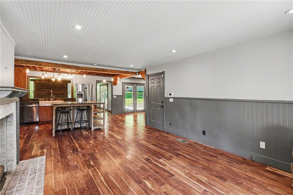 450 Big Springs Road Southeast Calhoun, GA 30701 - Photo 5 of 39 a dining room with furniture and wooden floor
