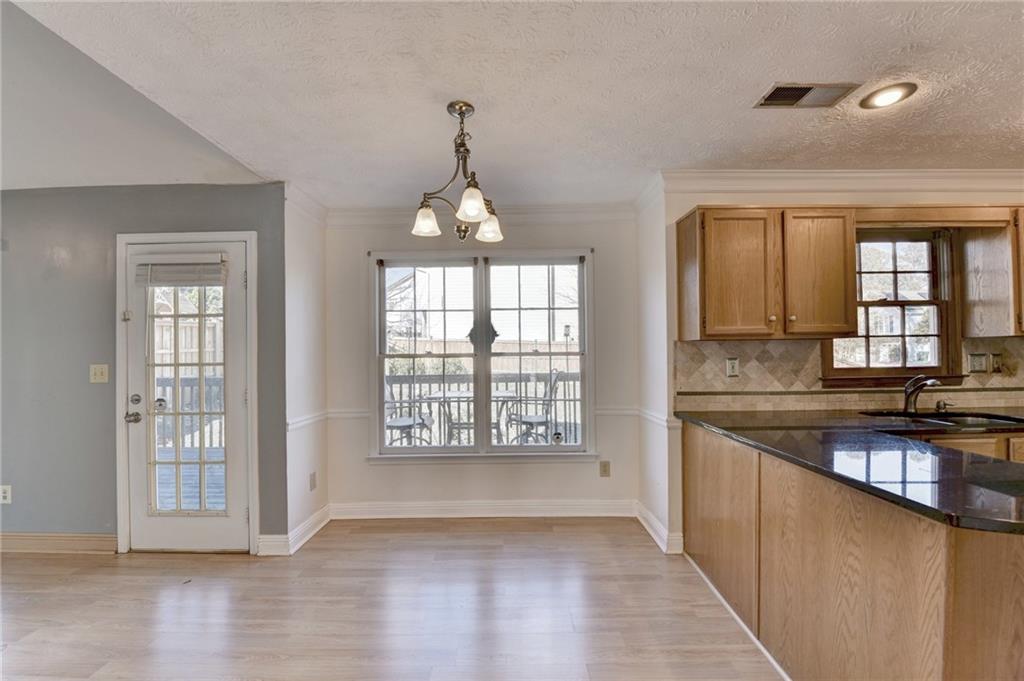 3945 Genoa Court Duluth, GA 30096 - Photo 29 of 64 a view of a kitchen with windows