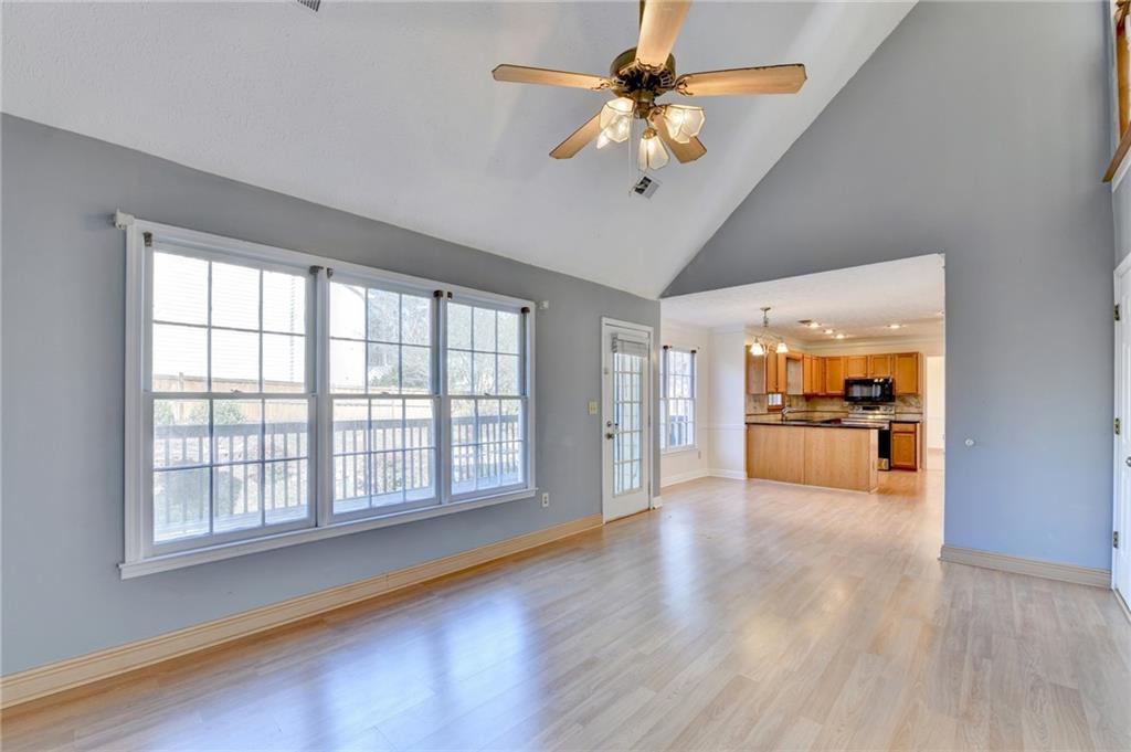 3945 Genoa Court Duluth, GA 30096 - Photo 35 of 64 wooden floor in an empty room with a window