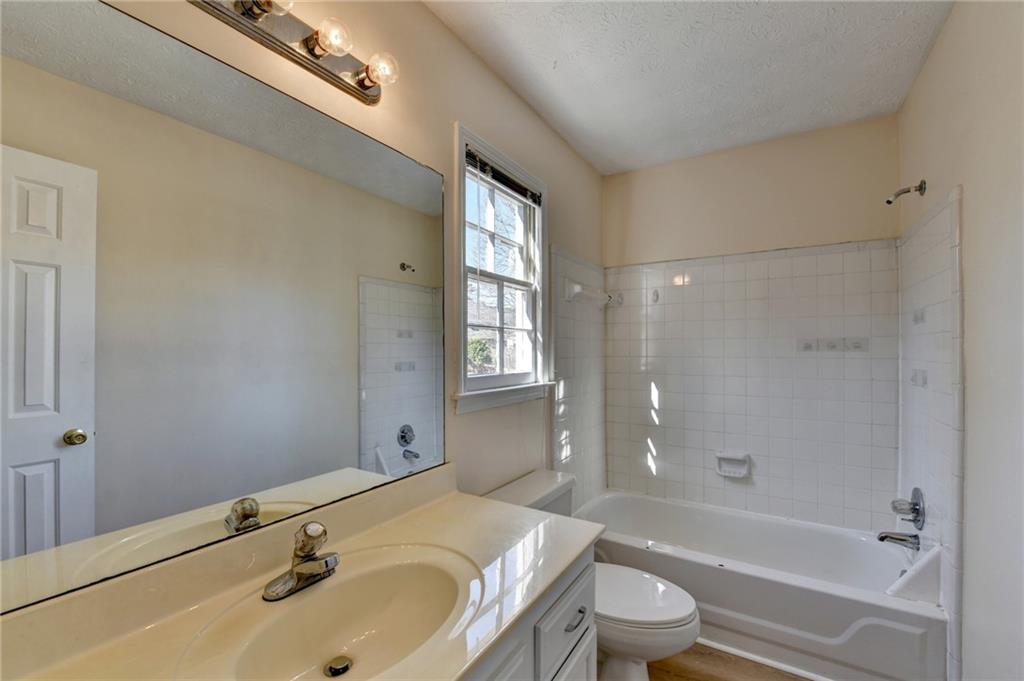 3945 Genoa Court Duluth, GA 30096 - Photo 57 of 64 a bathroom with a sink toilet tub and shower