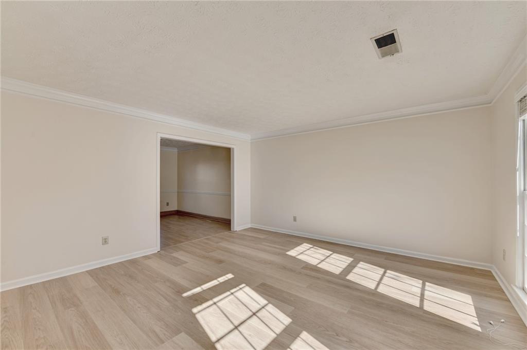 3945 Genoa Court Duluth, GA 30096 - Photo 10 of 64 an empty room with windows