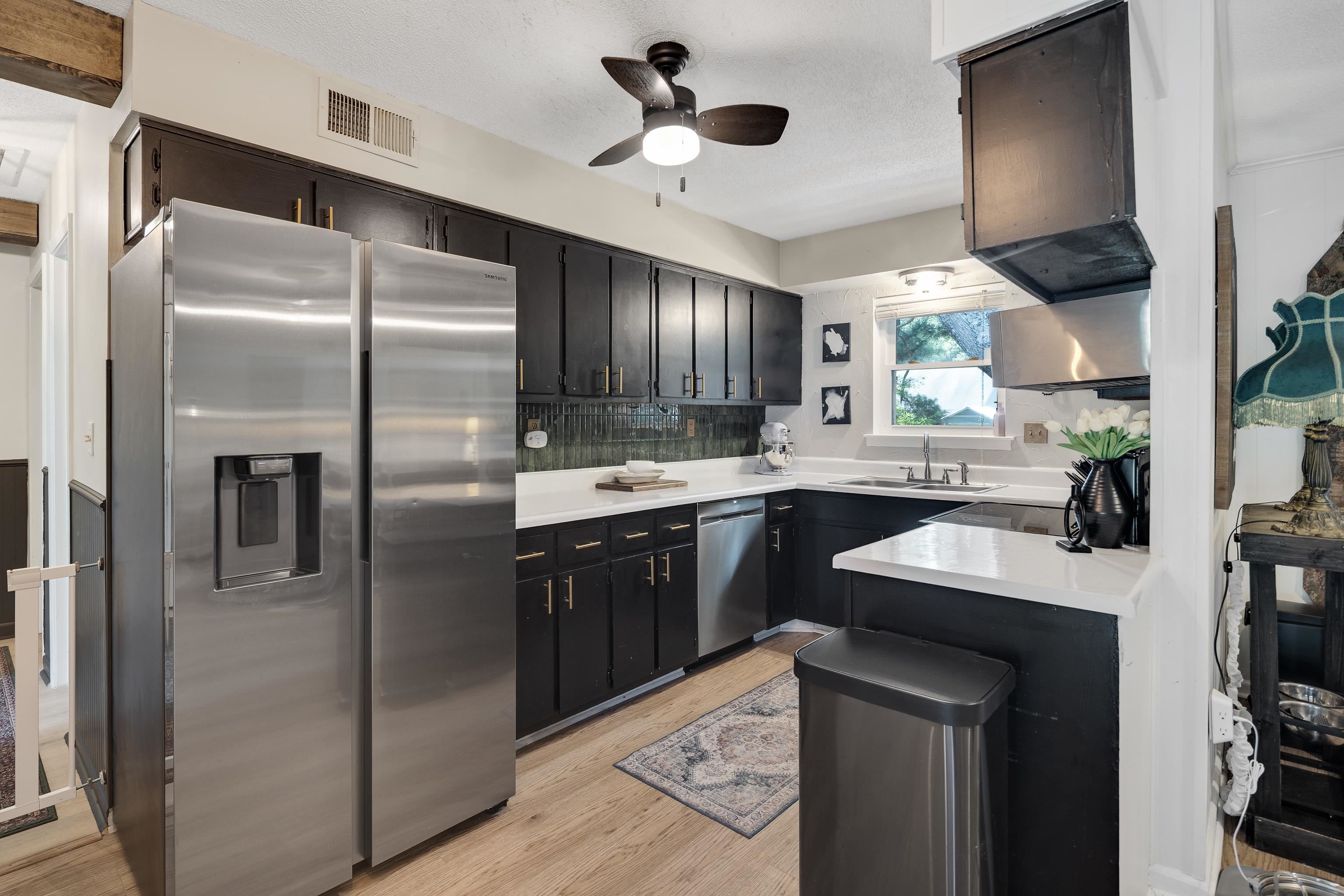 1137 Greenview Road Collierville, TN 38017 - Photo 11 of 35 a kitchen with kitchen island a counter top space appliances and cabinets