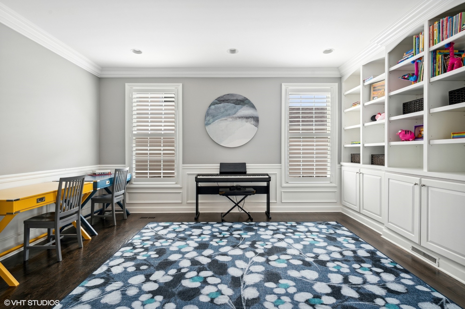 357 Madison Avenue Glencoe, IL 60022 - Photo 13 of 36 a living room with furniture a rug and a book shelf