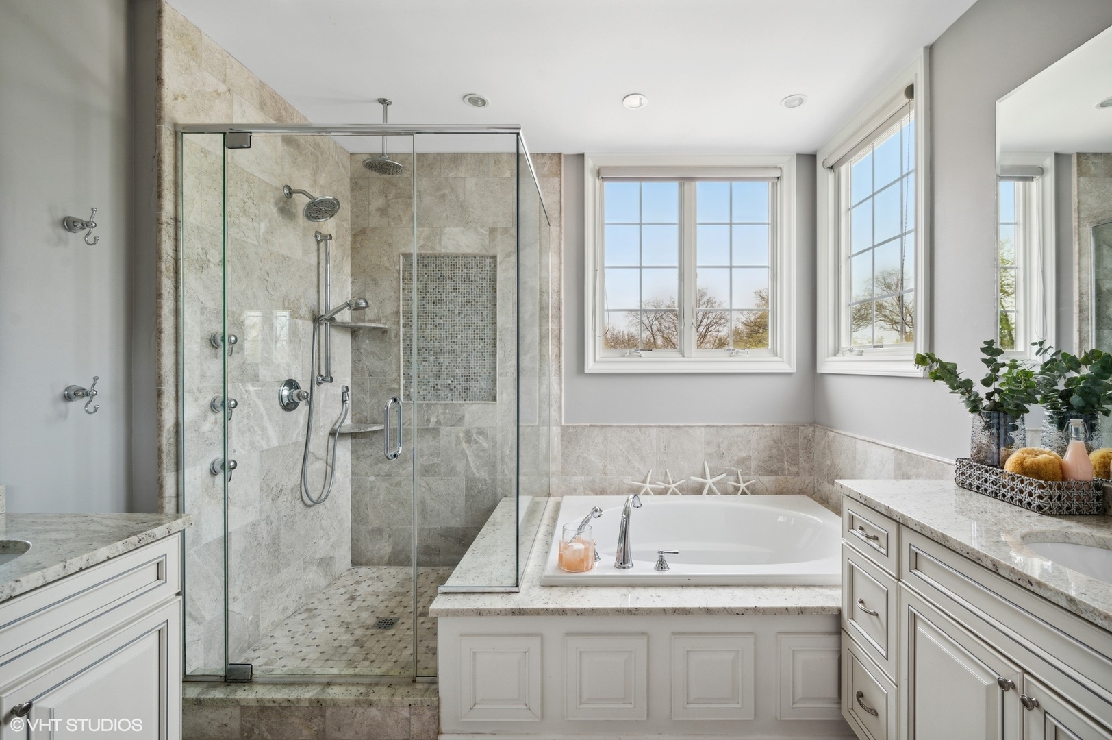 357 Madison Avenue Glencoe, IL 60022 - Photo 27 of 36 a bathroom with a granite countertop tub sink and shower