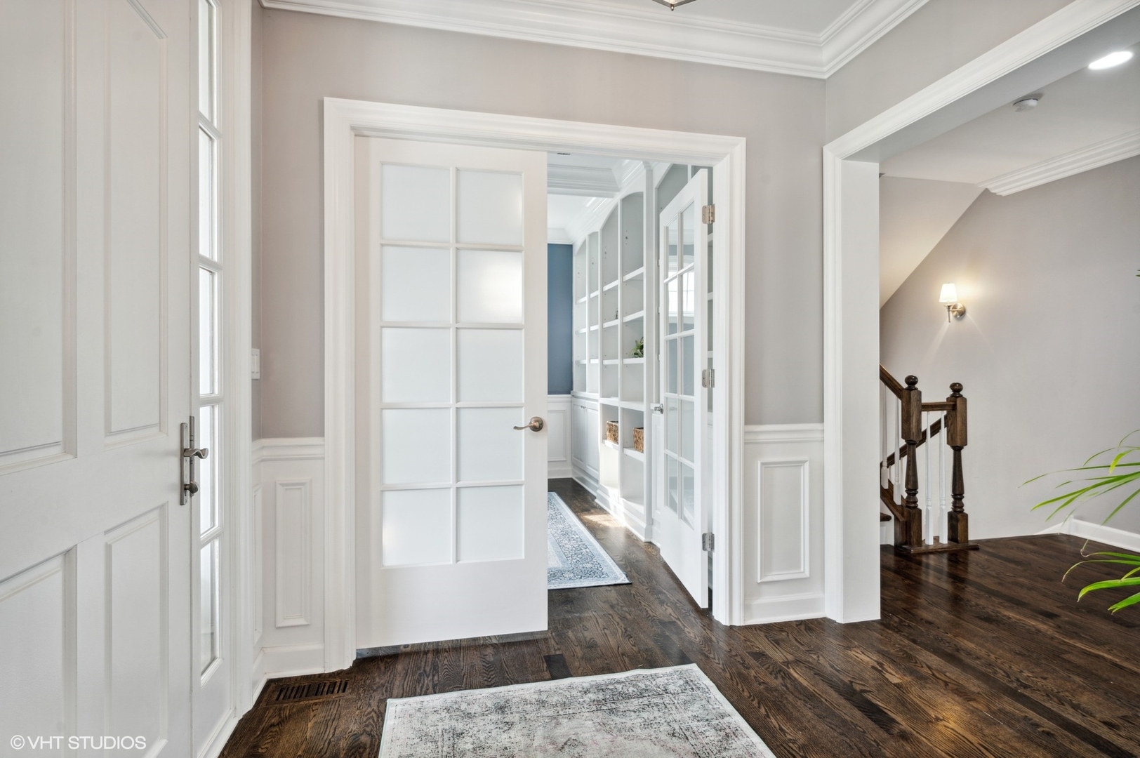 357 Madison Avenue Glencoe, IL 60022 - Photo 4 of 36 a view of a hallway with wooden floor and a living room