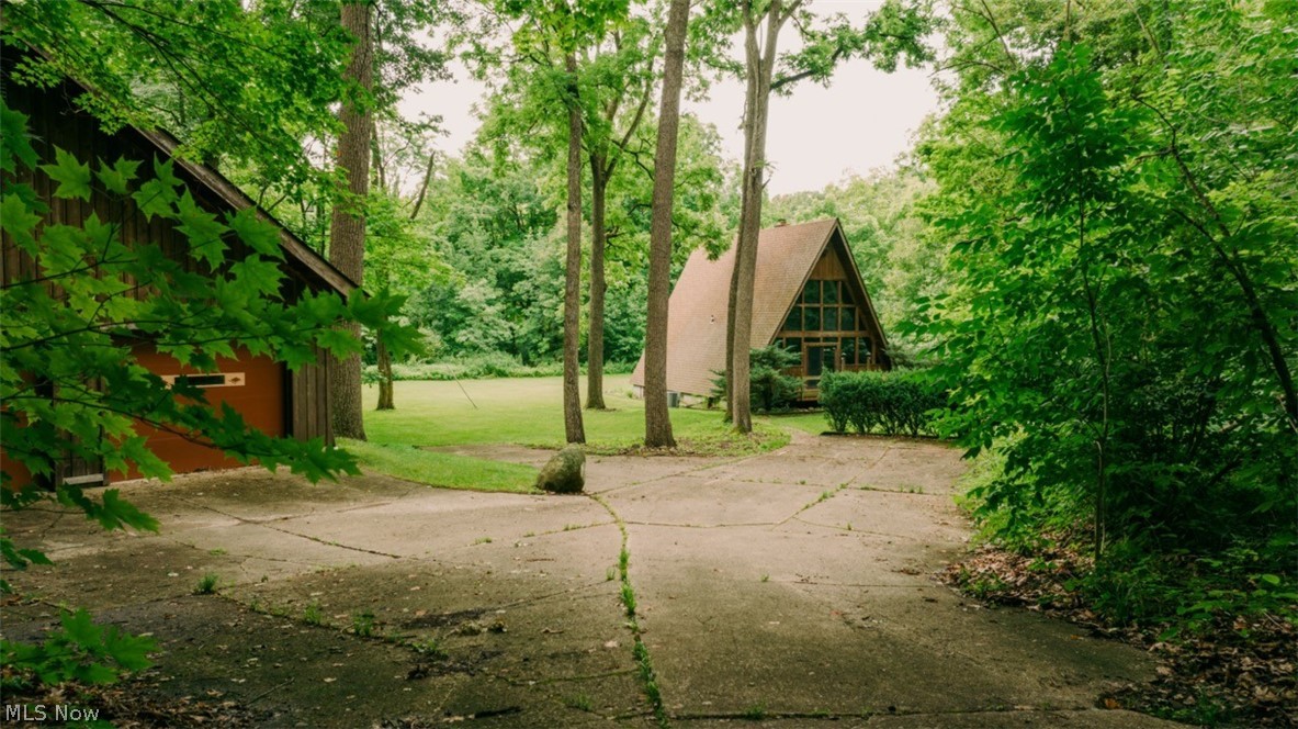 15765 Main Market Road Burton, OH 44021 - Photo 5 of 41 View of driveway and garage