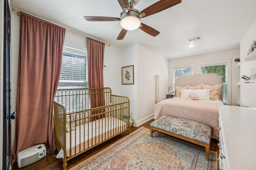 1227 Lansford Avenue Dallas, TX 75224 - Photo 13 of 17 a bedroom with a bed and window