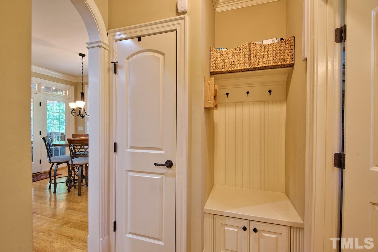 1 Springtree Circle Durham, NC 27712 - Photo 15 of 25 This hall area is between the garage and kitchen. How many ways can you visualize using this space?