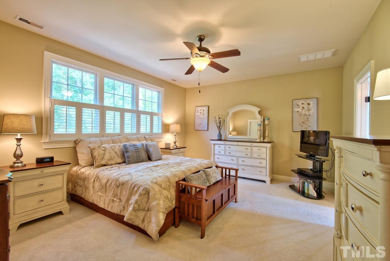 1 Springtree Circle Durham, NC 27712 - Photo 16 of 25 The spacious Master Bedroom is located on the second floor at the back of the home. It has a large walk in closet with built in shelving.