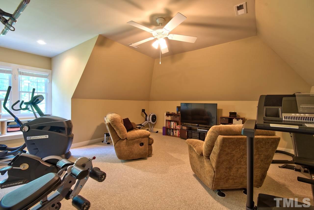 1 Springtree Circle Durham, NC 27712 - Photo 22 of 25 The Bonus Room is spacious! Could you use an extra living space, music room, theater, gym or craft room? There is a full bathroom in the Bonus Room and lots of walk in Attic space.