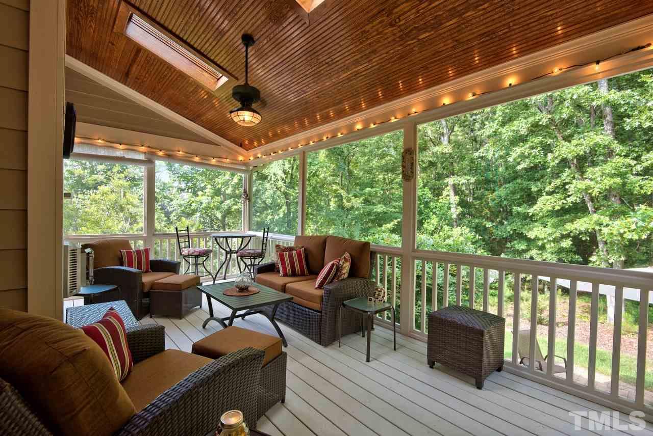1 Springtree Circle Durham, NC 27712 - Photo 23 of 25 This is a great place to enjoy all year long! The skylights, decorative lights and bead board ceiling give the screen porch so much character.