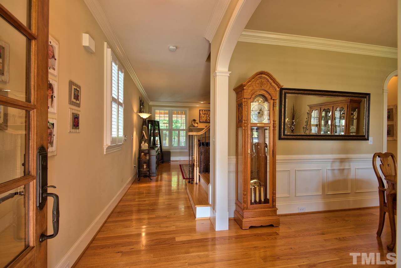 1 Springtree Circle Durham, NC 27712 - Photo 4 of 25 The Entry opens to the Dining and Family Room. Look at those gleaming hardwood floors throughout the main level.