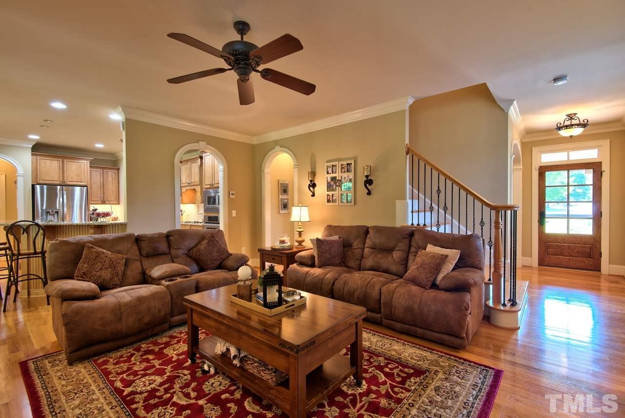 1 Springtree Circle Durham, NC 27712 - Photo 8 of 25 The Family Room has a Gas Fireplace and opens to the Kitchen. The Arched Doorways offer an elegant flow.