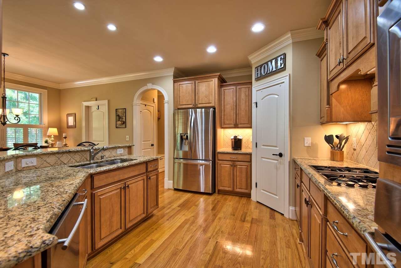1 Springtree Circle Durham, NC 27712 - Photo 10 of 25 Let's get cooking! All stainless steel appliances and the Refrigerator coveys. Ample cabinetry and recessed lighting.