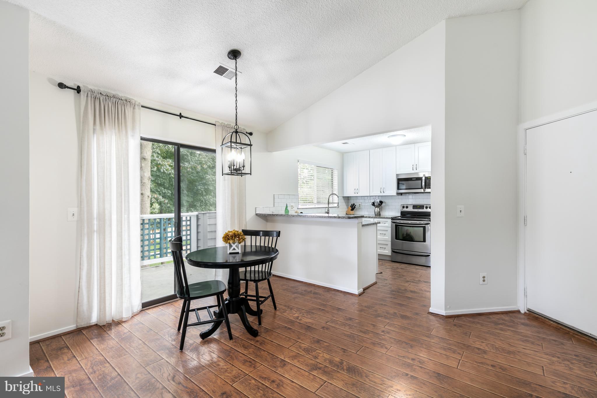 1504 Summerchase Court, Unit B Reston, VA 20194 - Photo 6 of 22 Dining Room with access to private balcony