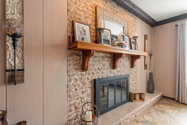 a view of a livingroom with a fireplace