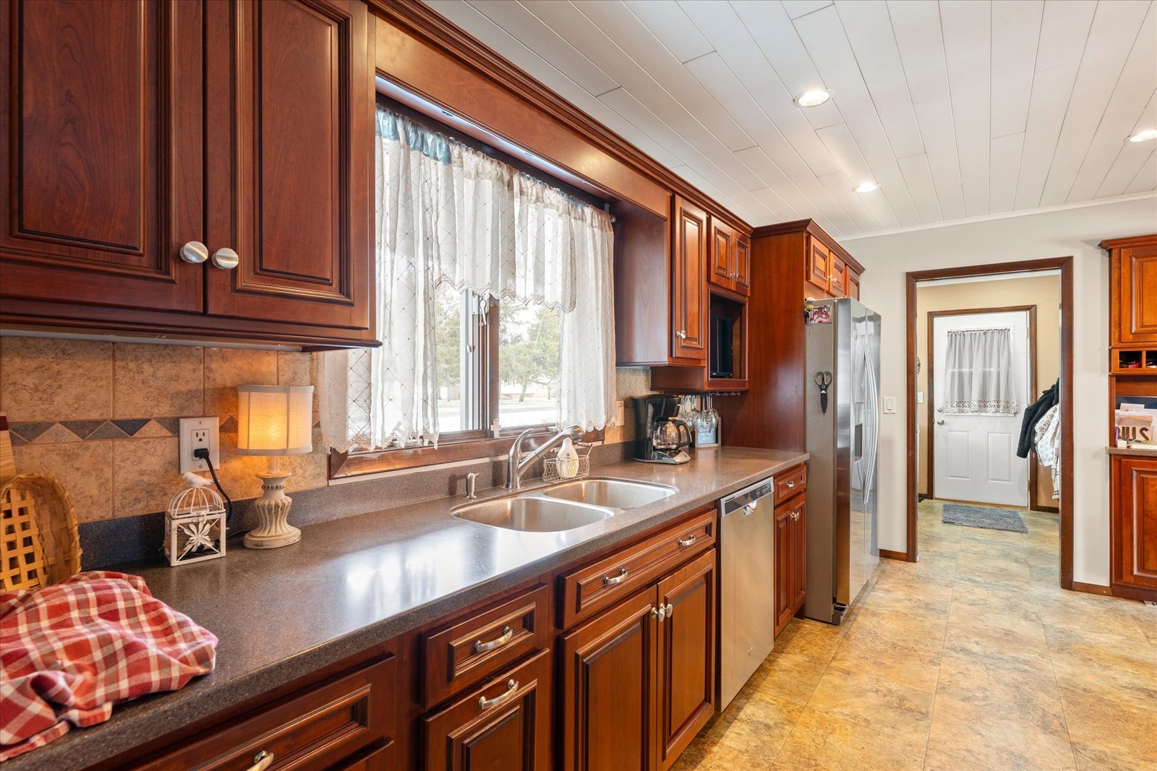 617 West 4th Street Homer, IL 61849 - Photo 19 of 42 a kitchen with stainless steel appliances a sink stove and cabinets