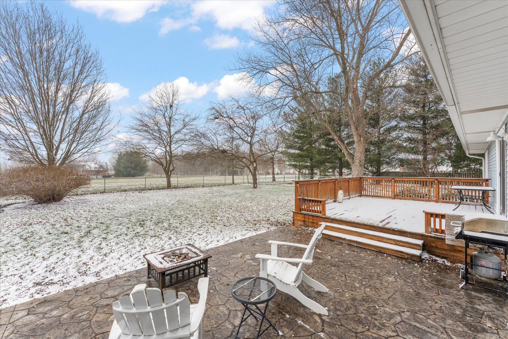 617 West 4th Street Homer, IL 61849 - Photo 39 of 42 a backyard of a house with table and chairs