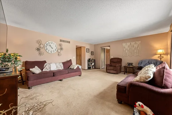 a living room with furniture and a couch