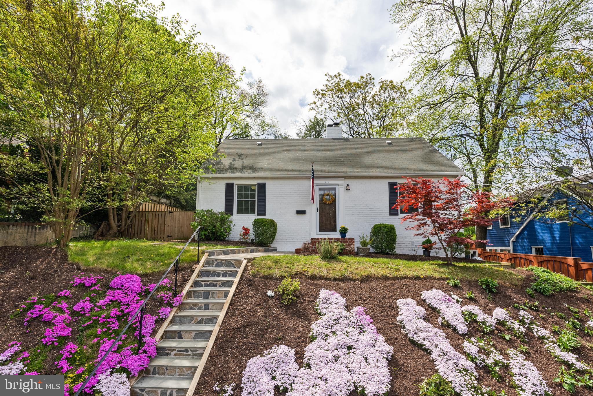 716 Upland Place Alexandria, VA 22314 - Photo 1 of 50 a front view of a house with garden