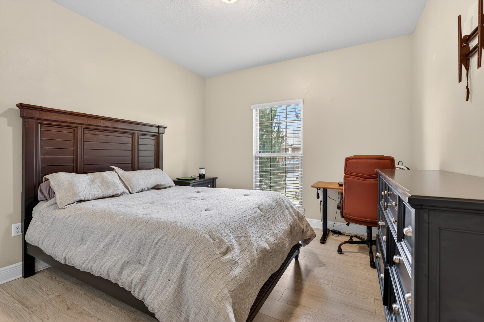 511 Gadwell Street Crestview, FL 32539 - Photo 18 of 48 a bedroom with a bed chair and a window