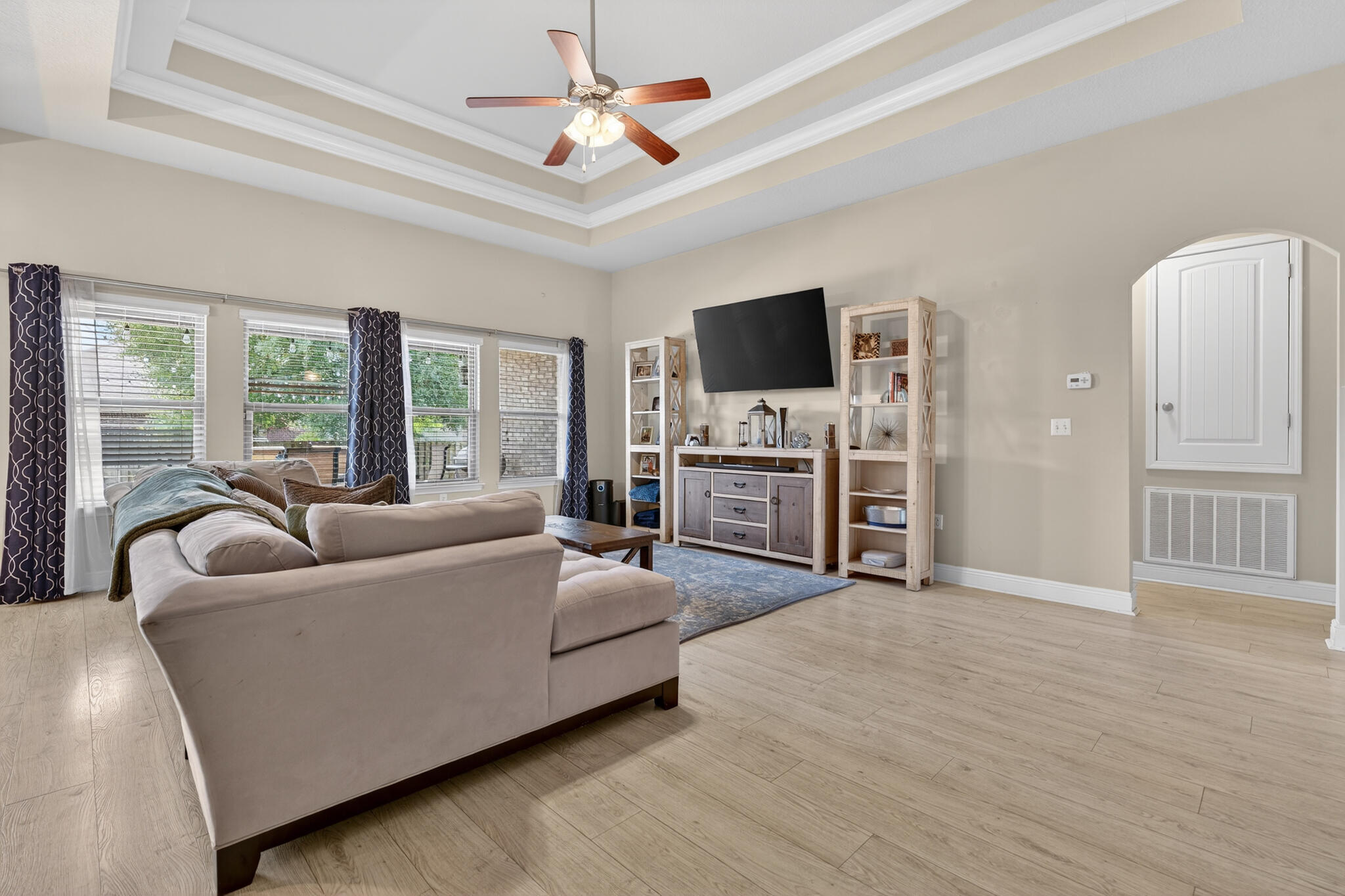 511 Gadwell Street Crestview, FL 32539 - Photo 28 of 48 a living room with furniture and a flat screen tv