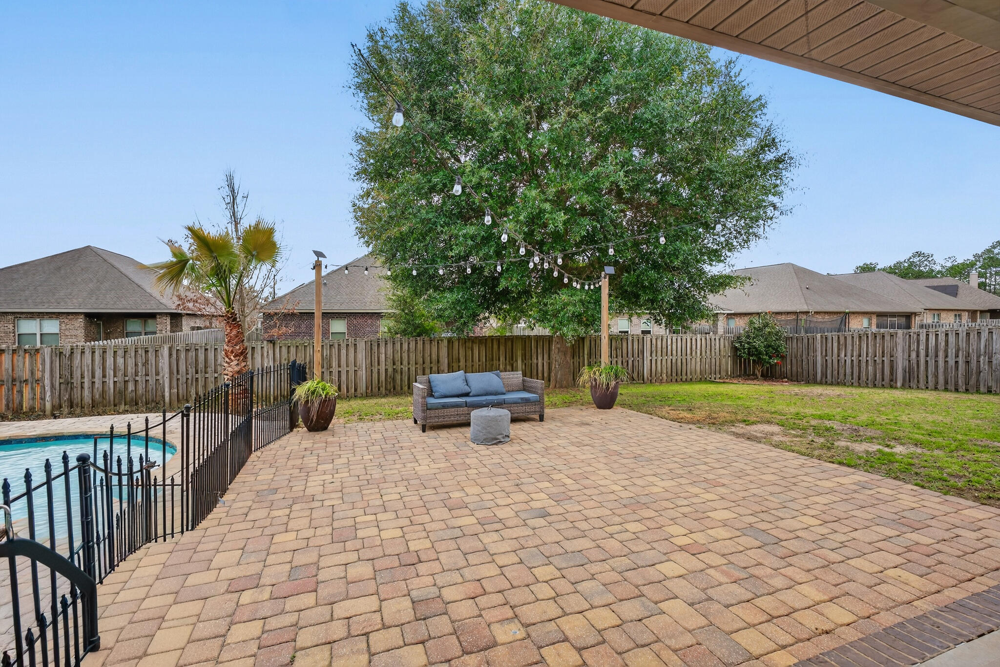 511 Gadwell Street Crestview, FL 32539 - Photo 34 of 48 a view of a house with backyard and sitting area
