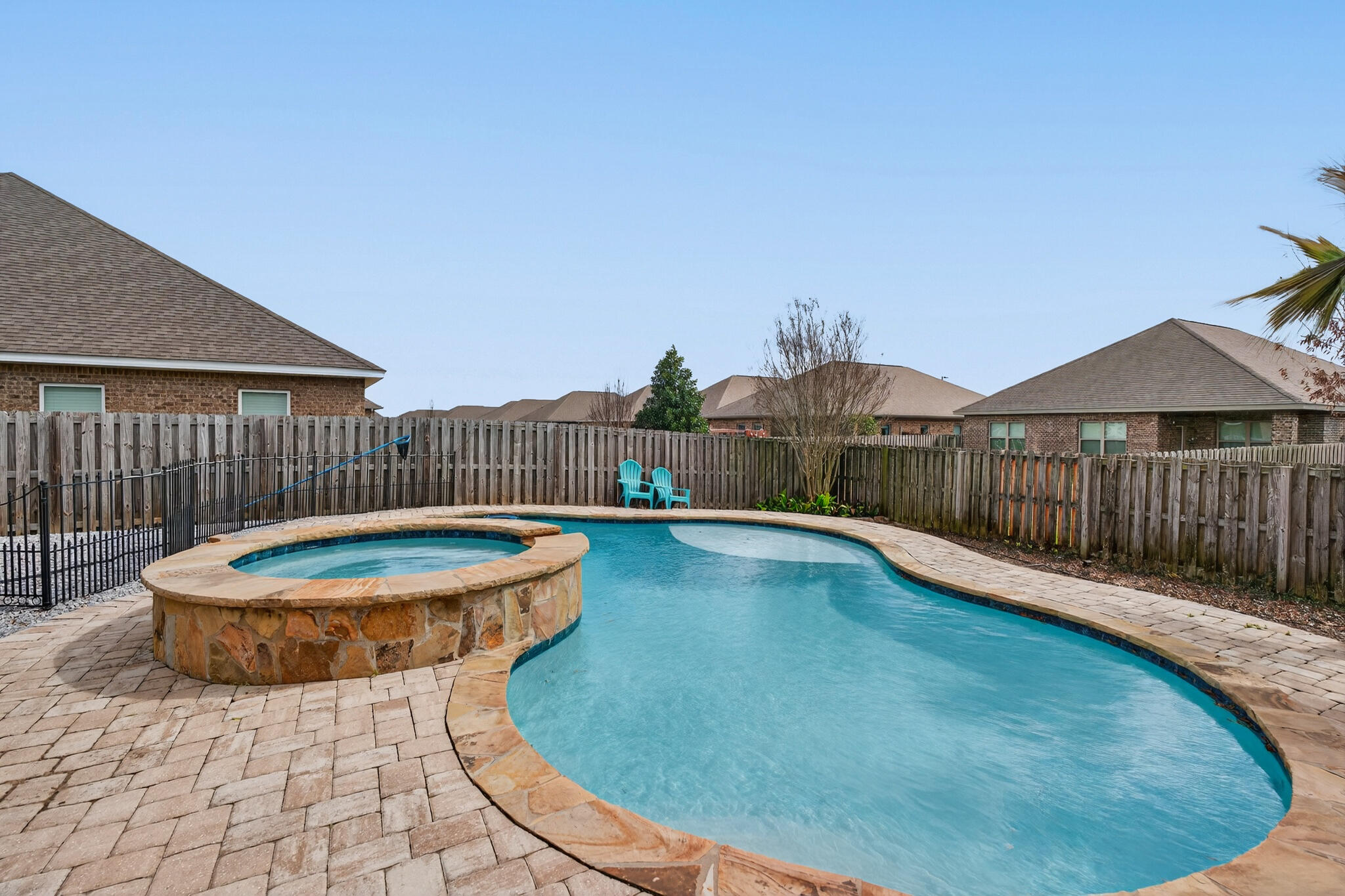511 Gadwell Street Crestview, FL 32539 - Photo 36 of 48 a view of a swimming pool with a patio